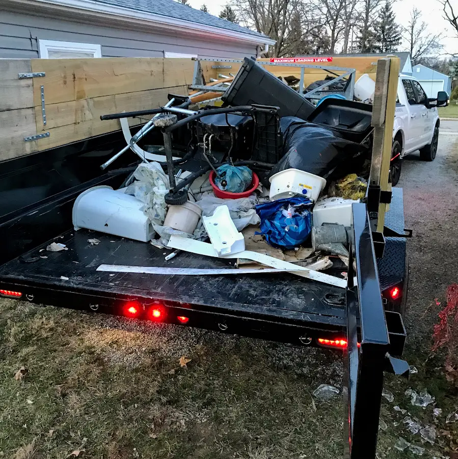 Roll-off dumpster delivered to a residential driveway in Lansdowne
