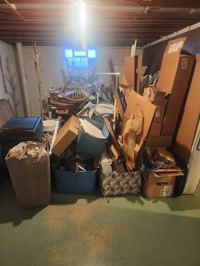 Roll-off dumpster container at job site for 2 Yard Dumpster Rental in Lansdowne